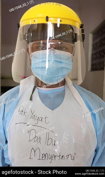 A medical worker wear face shield and protective gear as a preventive measure, at a Quarantine Shelter Home, Bandung Regency, Indonesia